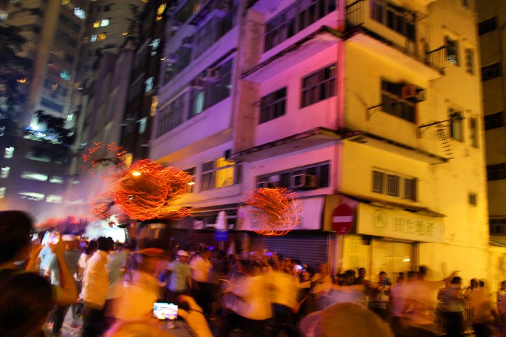 The Tai Hang Fire Dragon darts through the streets of suburban Tai Hang. | Tai Hang Fire Dragon Dance, Tai Hang, Hong Kong | September 27, 2015 | Tanya McGovern